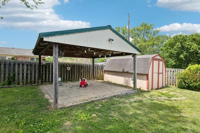 805 Springmont Dr, Hopkinsville, KY 42240 - fenced backyard with a storage shed and a patio area