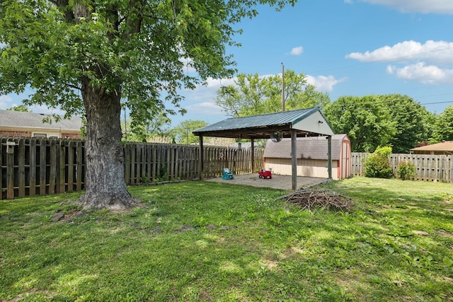 805 Springmont Dr, Hopkinsville, KY 42240 - fenced backyard featuring a storage unit