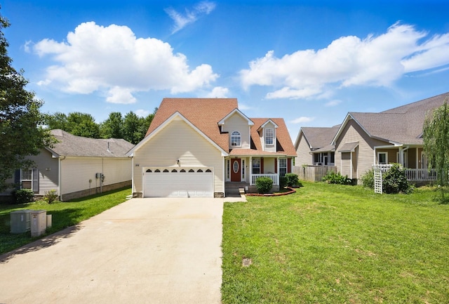 3716 S Jot Dr, Clarksville, TN 37040 - traditional home featuring a garage, driveway, a front yard, and a porch