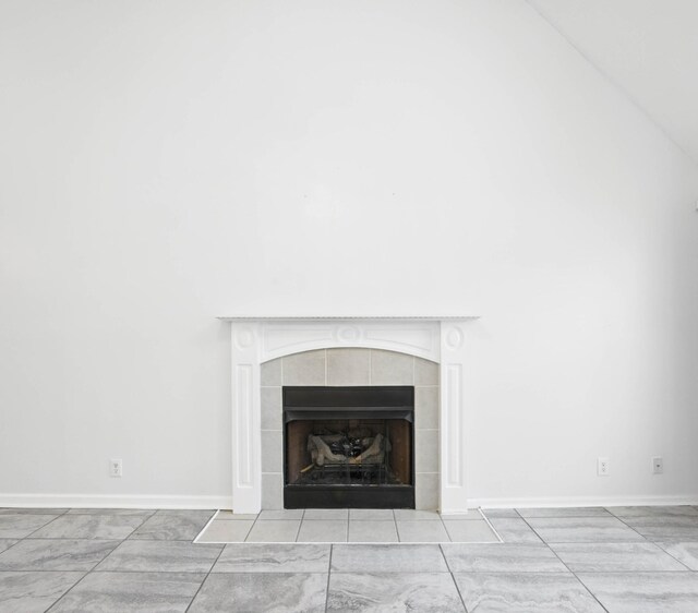 3716 S Jot Dr, Clarksville, TN 37040 - detailed view of a tiled fireplace and baseboards