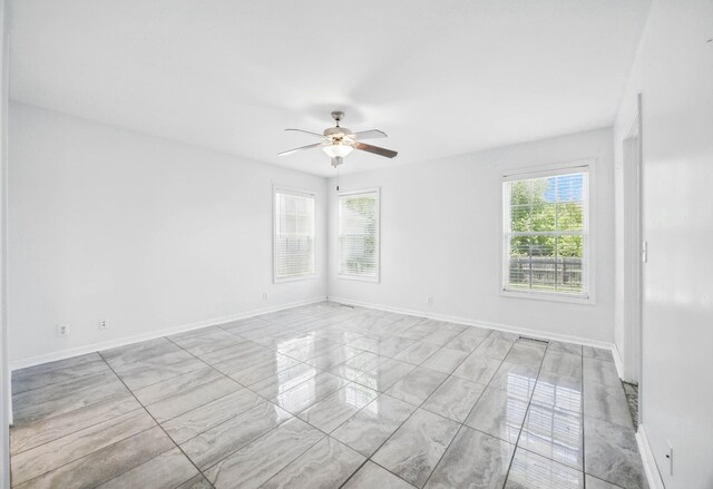 3716 S Jot Dr, Clarksville, TN 37040 - empty room featuring ceiling fan, baseboards, and marble finish flooring
