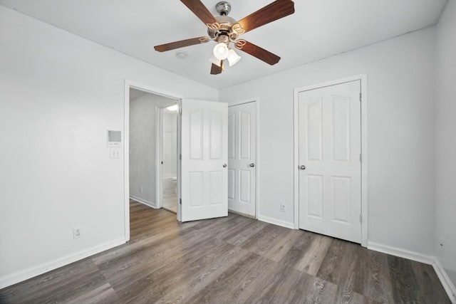 3716 S Jot Dr, Clarksville, TN 37040 - unfurnished bedroom with baseboards and wood finished floors