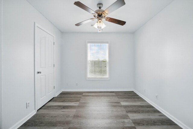3716 S Jot Dr, Clarksville, TN 37040 - unfurnished bedroom with wood finished floors, baseboards, and ceiling fan