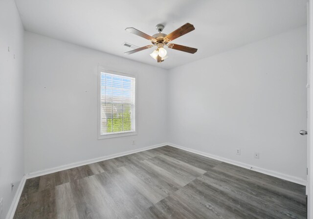 3716 S Jot Dr, Clarksville, TN 37040 - spare room with a ceiling fan, wood finished floors, and baseboards