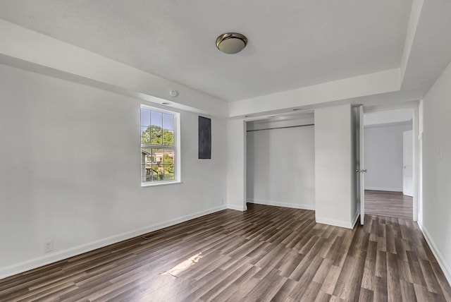 226 Higdon St, Lynnville, TN 38472 - unfurnished bedroom with dark wood-style floors, baseboards, and a closet