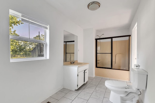 226 Higdon St, Lynnville, TN 38472 - bathroom with marble look tile flooring, toilet, vanity, tub / shower combination, and baseboards