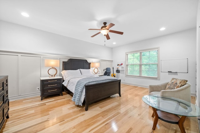 127 Copperstone Dr, Clarksville, TN 37043 - bedroom with light wood-style floors, a decorative wall, ceiling fan, and recessed lighting