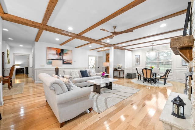 127 Copperstone Dr, Clarksville, TN 37043 - living area featuring a ceiling fan, beamed ceiling, a decorative wall, light wood finished floors, and coffered ceiling