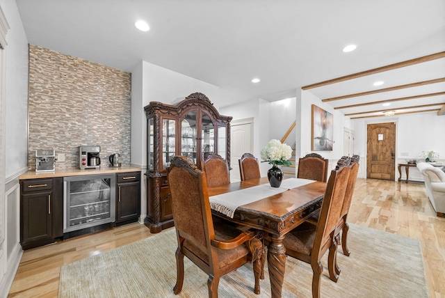 127 Copperstone Dr, Clarksville, TN 37043 - dining room with beverage cooler, light wood-type flooring, a dry bar, and recessed lighting