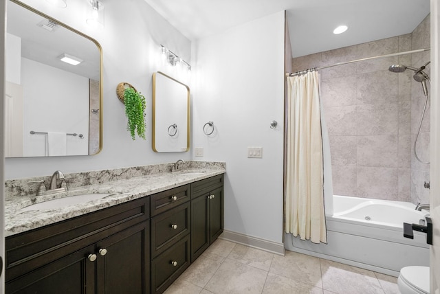 127 Copperstone Dr, Clarksville, TN 37043 - full bath with double vanity, shower / tub combo with curtain, tile patterned floors, toilet, and baseboards