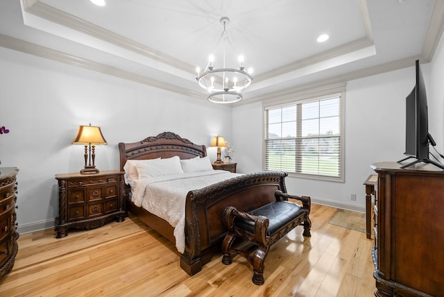 127 Copperstone Dr, Clarksville, TN 37043 - bedroom featuring a tray ceiling, a chandelier, light wood-type flooring, baseboards, and crown molding