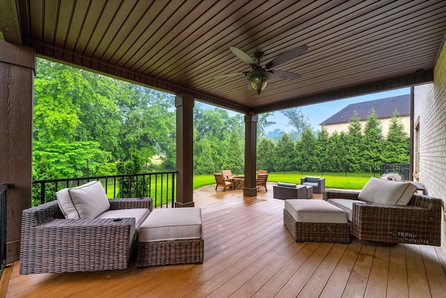 127 Copperstone Dr, Clarksville, TN 37043 - wooden deck with outdoor lounge area and ceiling fan