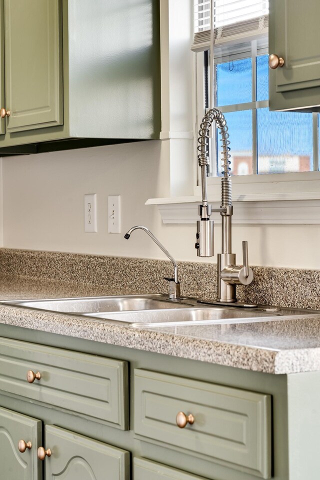 3889 Mackenzie Dr, Clarksville, TN 37042 - kitchen view of green cabinetry and light countertops