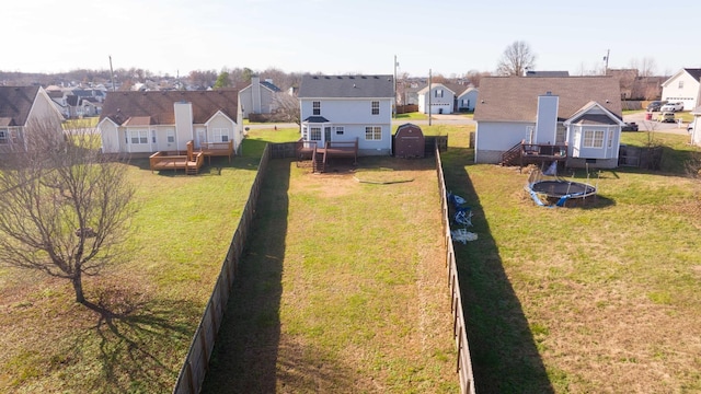 3889 Mackenzie Dr, Clarksville, TN 37042 - view of yard featuring a residential view, a wooden deck, and a trampoline