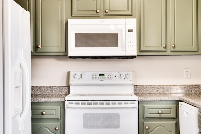 3889 Mackenzie Dr, Clarksville, TN 37042 - kitchen featuring green cabinetry, white appliances, and light countertops
