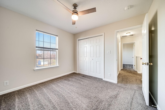3889 Mackenzie Dr, Clarksville, TN 37042 - unfurnished bedroom featuring carpet, baseboards, a closet, and ceiling fan