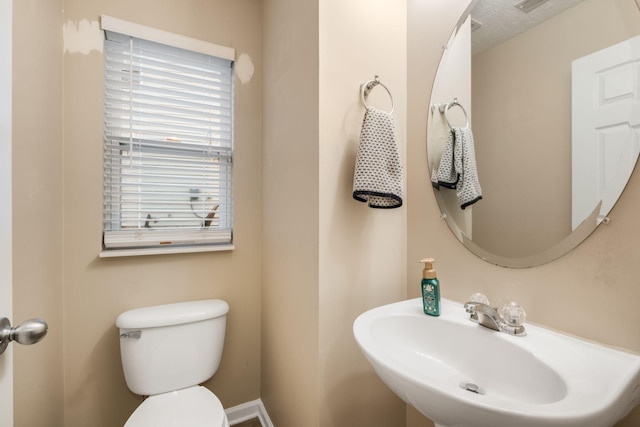 905 Arbor Springs Dr, Mount Juliet, TN 37122 - bathroom featuring a sink, toilet, and baseboards