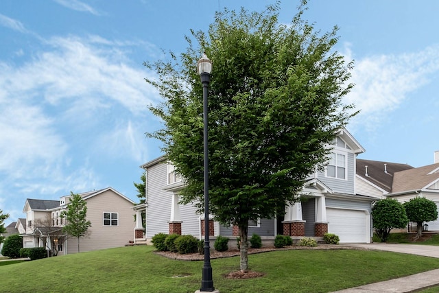 905 Arbor Springs Dr, Mount Juliet, TN 37122 - view of property hidden behind natural elements featuring concrete driveway, a front lawn, a garage, and brick siding