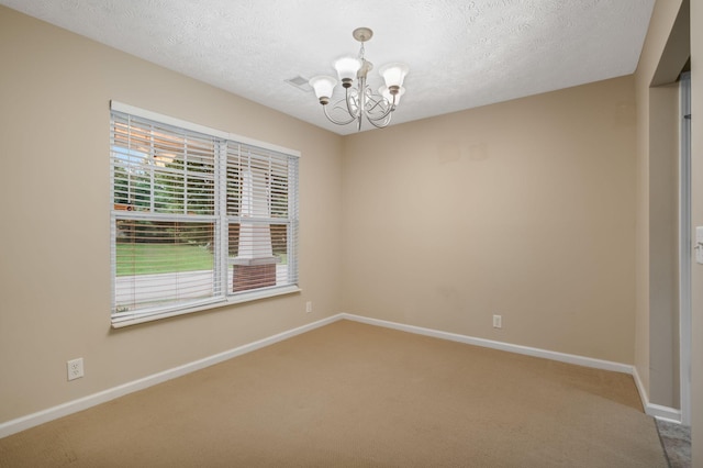 905 Arbor Springs Dr, Mount Juliet, TN 37122 - spare room with a chandelier, carpet flooring, baseboards, and a textured ceiling
