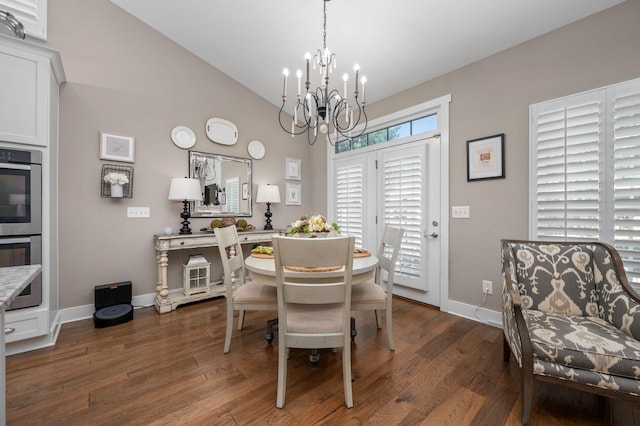 390 Buckingham Blvd, Gallatin, TN 37066 - dining room featuring a chandelier, baseboards, dark wood-type flooring, and high vaulted ceiling