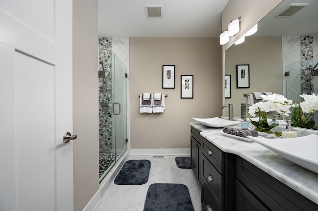 390 Buckingham Blvd, Gallatin, TN 37066 - bathroom with double vanity, a shower stall, marble look tile flooring, and baseboards