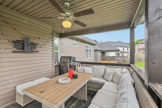 974 Bonellis Ln, Clarksville, TN 37040 - deck featuring outdoor lounge area, a ceiling fan, area for grilling, outdoor dining area, and a residential view