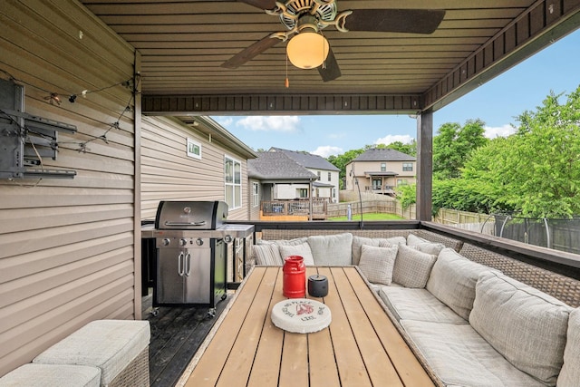 974 Bonellis Ln, Clarksville, TN 37040 - wooden terrace with an outdoor living space, a grill, a fenced backyard, and ceiling fan