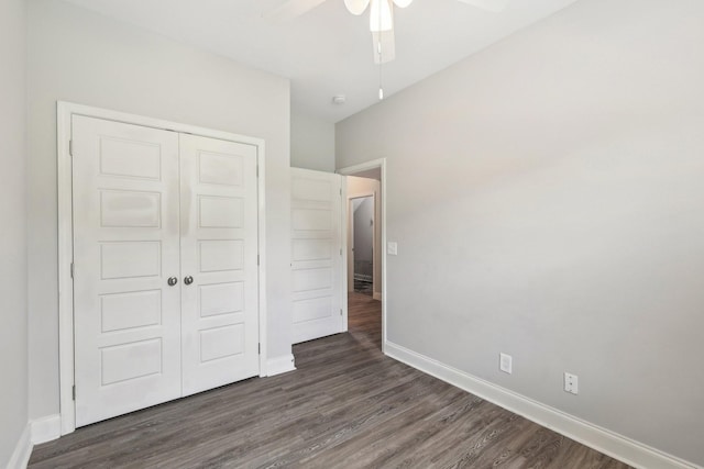 974 Bonellis Ln, Clarksville, TN 37040 - unfurnished bedroom with wood finished floors, a closet, baseboards, and a ceiling fan