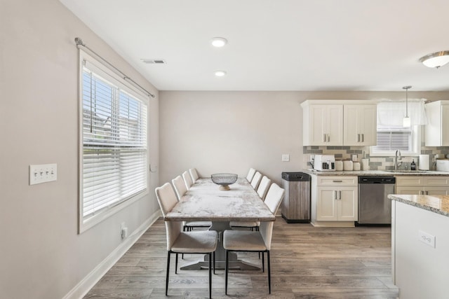 974 Bonellis Ln, Clarksville, TN 37040 - dining space with light wood-style flooring, baseboards, and recessed lighting