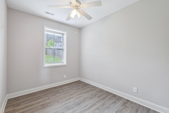 974 Bonellis Ln, Clarksville, TN 37040 - spare room with light wood-style floors, baseboards, and ceiling fan