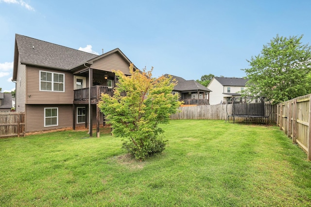 974 Bonellis Ln, Clarksville, TN 37040 - back of house featuring a trampoline and a shingled roof