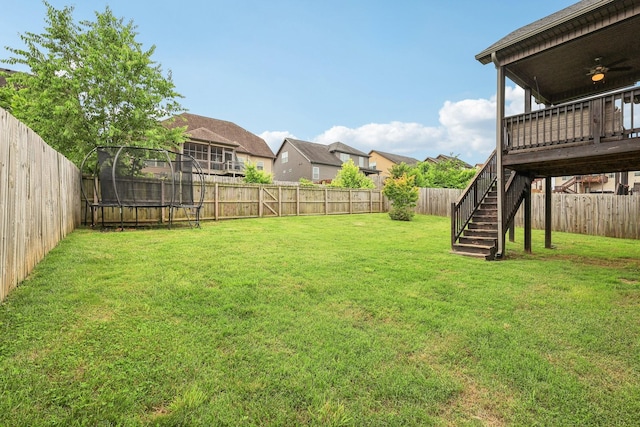 974 Bonellis Ln, Clarksville, TN 37040 - view of yard featuring a trampoline, stairs, a residential view, and a deck