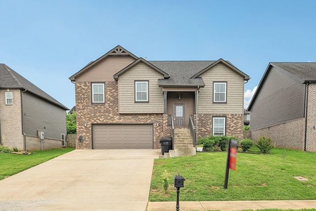 974 Bonellis Ln, Clarksville, TN 37040 - view of front of house with brick siding, concrete driveway, and an attached garage