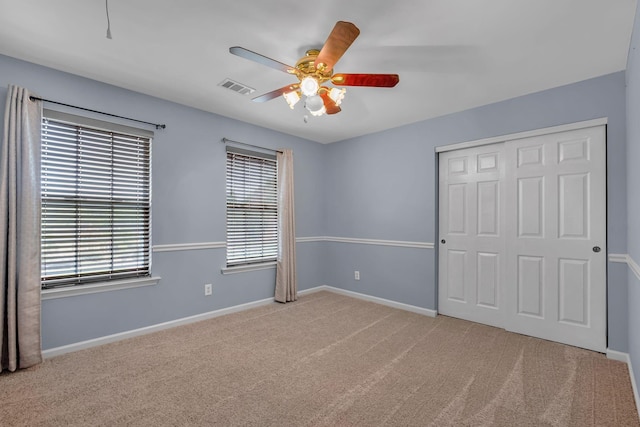 6948 Stone Run Dr, Nashville, TN 37211 - unfurnished bedroom with a closet, carpet, a ceiling fan, and baseboards