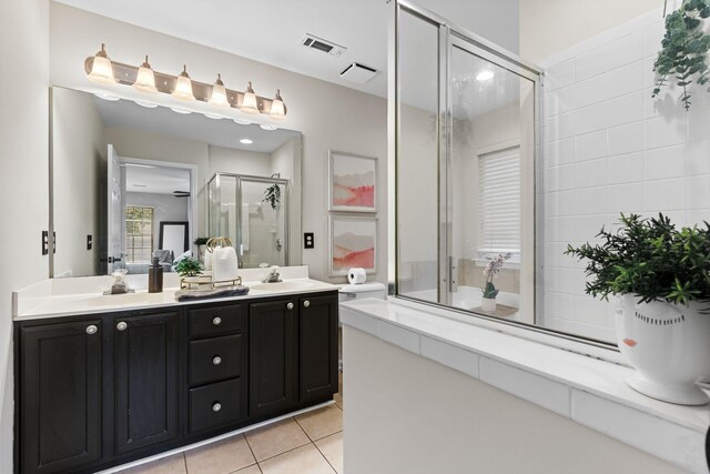 3224 Nolen Ln, Franklin, TN 37064 - bathroom featuring double vanity, a shower stall, and tile patterned flooring