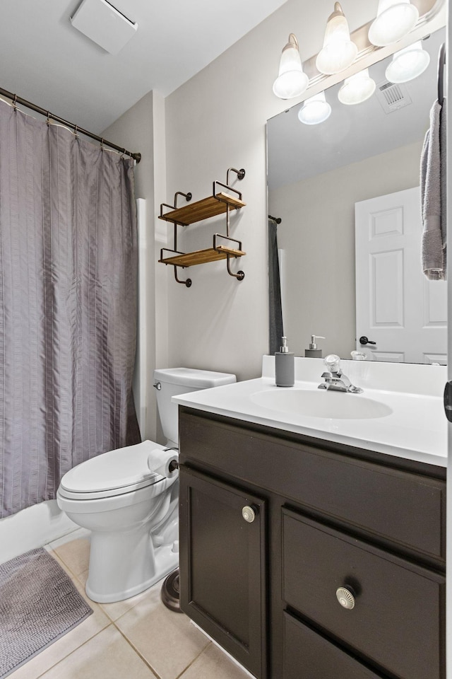 3224 Nolen Ln, Franklin, TN 37064 - bathroom featuring toilet, vanity, and tile patterned flooring