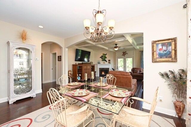102 Cobbler Cir, Hendersonville, TN 37075 - dining area featuring a ceiling fan, arched walkways, a chandelier, wood finished floors, and baseboards