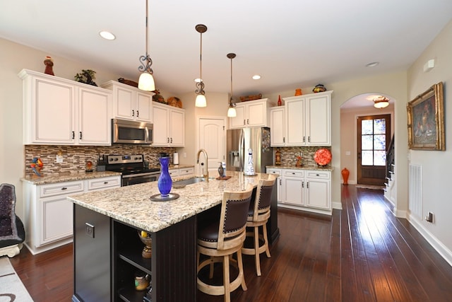 102 Cobbler Cir, Hendersonville, TN 37075 - kitchen featuring appliances with stainless steel finishes, a sink, white cabinetry, and recessed lighting