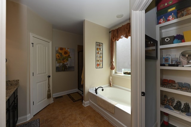 102 Cobbler Cir, Hendersonville, TN 37075 - bathroom featuring a bath, tile patterned flooring, vanity, baseboards, and a shower