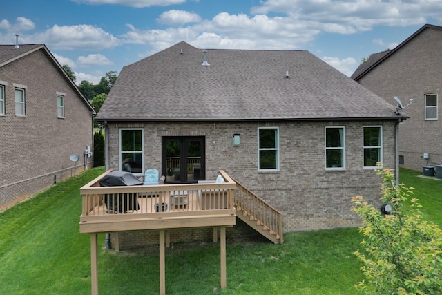 102 Cobbler Cir, Hendersonville, TN 37075 - rear view of house with a shingled roof, a wooden deck, a yard, brick siding, and stairs