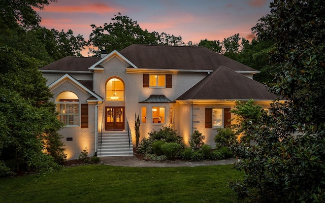 414 Gentlemens Rdg, Signal Mountain, TN 37377 - view of front facade with brick siding, a yard, and a chimney