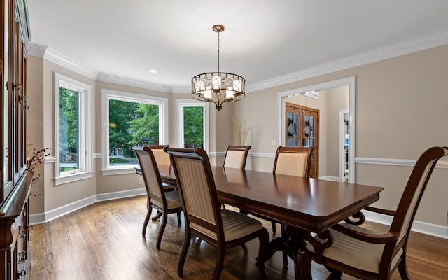 414 Gentlemens Rdg, Signal Mountain, TN 37377 - dining space with ornamental molding, baseboards, french doors, light wood finished floors, and a chandelier