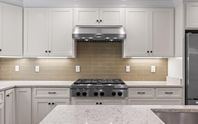 414 Gentlemens Rdg, Signal Mountain, TN 37377 - kitchen featuring extractor fan, appliances with stainless steel finishes, white cabinetry, and tasteful backsplash