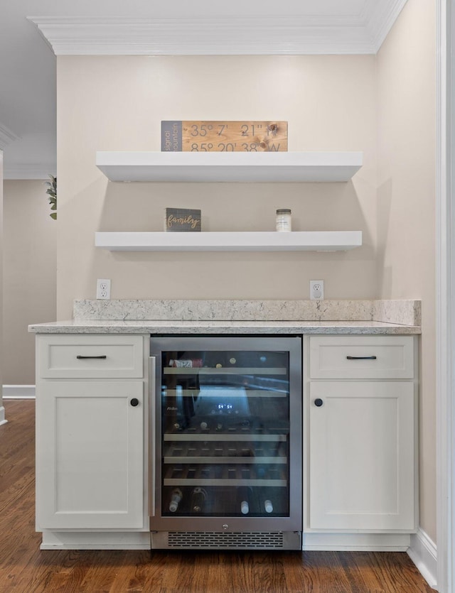 414 Gentlemens Rdg, Signal Mountain, TN 37377 - indoor dry bar with wine cooler, ornamental molding, dark wood-type flooring, and baseboards