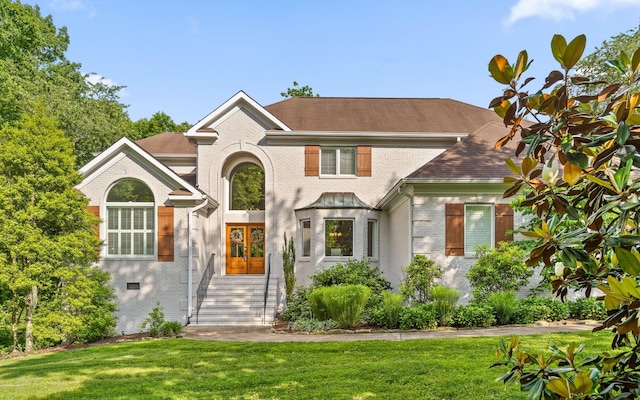414 Gentlemens Rdg, Signal Mountain, TN 37377 - view of front of property with brick siding, a front yard, and roof with shingles