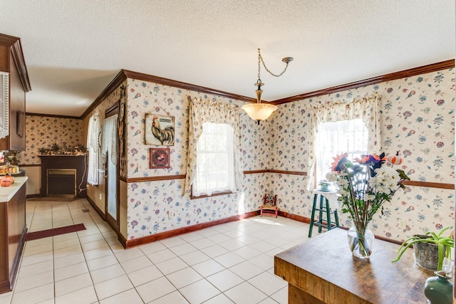 2119 W Lincoln St, Tullahoma, TN 37388 - dining room with crown molding, light tile patterned floors, wallpapered walls, baseboards, and a textured ceiling