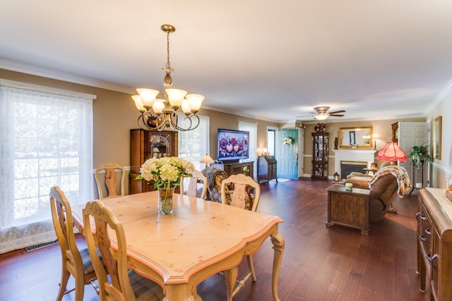 2119 W Lincoln St, Tullahoma, TN 37388 - dining area with a chandelier, dark wood finished floors, ornamental molding, and plenty of natural light