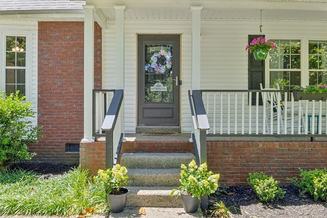 4010 Swift Springs Ct, Goodlettsville, TN 37072 - view of exterior entry featuring a porch and brick siding