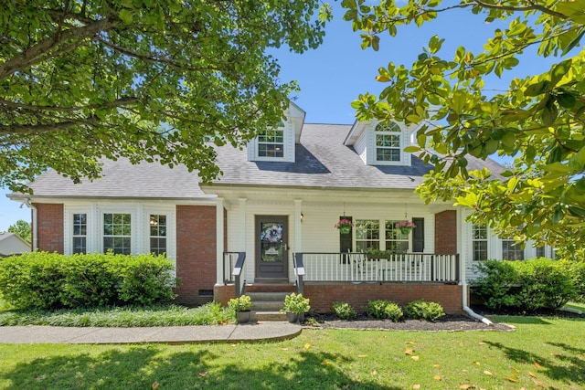 4010 Swift Springs Ct, Goodlettsville, TN 37072 - cape cod house featuring a porch, a front lawn, a shingled roof, brick siding, and crawl space