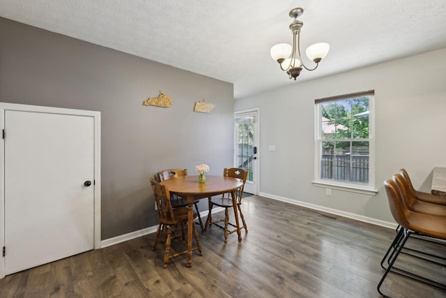 4010 Swift Springs Ct, Goodlettsville, TN 37072 - dining space featuring a chandelier, wood finished floors, baseboards, and a textured ceiling